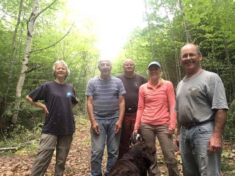 Locke trail work crew (R-L): Phil Auger, land manager; Rue Teel, seasonal land steward; and volunteers Fred Borman, Steve Farrington and Ginna Schonwald