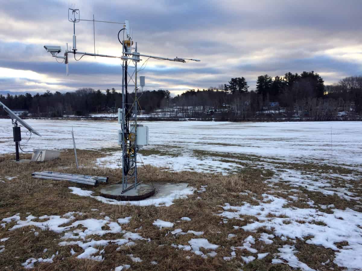 Tower with automated sensors at Kingman Farm hayfield in winter. Credit: Elizabeth Burakowski